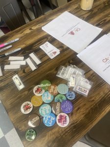 Commonwealth autism adult programs career readiness and employment orientation materials including pins employee handbook and nametags